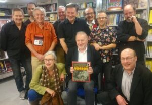 Steve Crisp, Joe Roberts, Jim Burns, Les Edwards, Barry Forshaw, Kim Newman, Graham Humphreys and Dave McKean, Stephen Jones flanked by Elephant Book Company's Laura Ward and Will Steeds